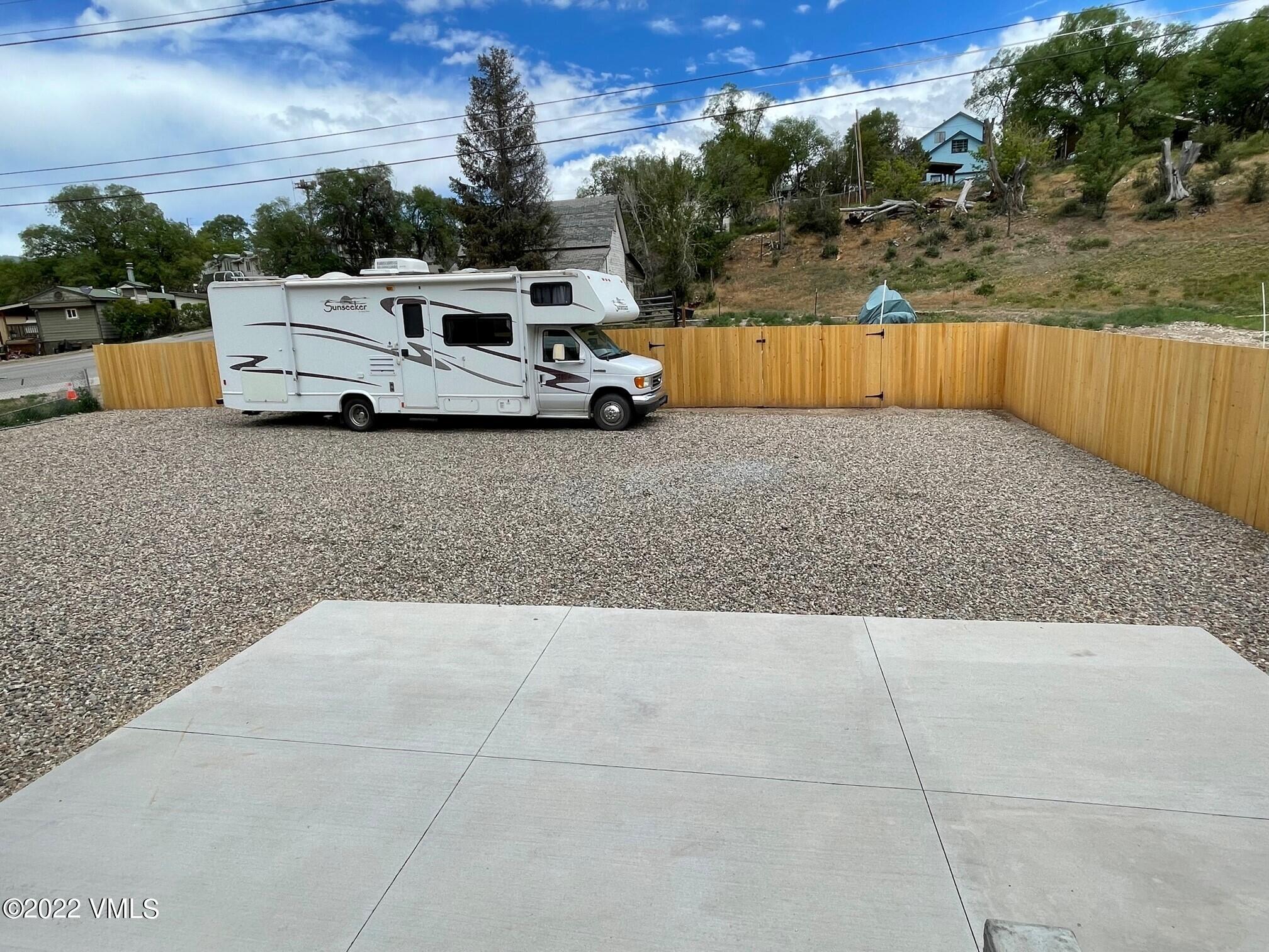 306 Howard Street Eagle, CO 81631 - Photo 30 of 30 a house view with a garden