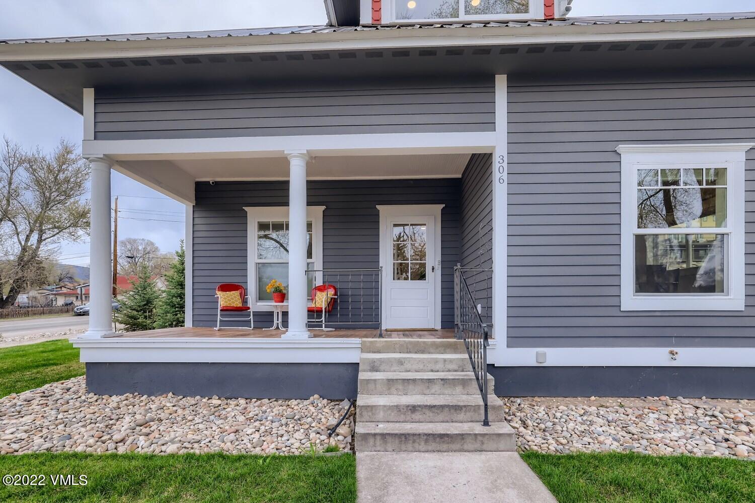 306 Howard Street Eagle, CO 81631 - Photo 4 of 30 a front view of a house with a yard