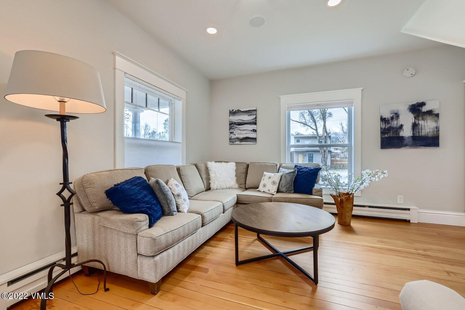 306 Howard Street Eagle, CO 81631 - Photo 6 of 30 a living room with furniture and a window