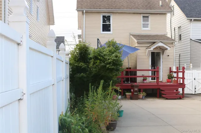 a view of a car parked in front of a house