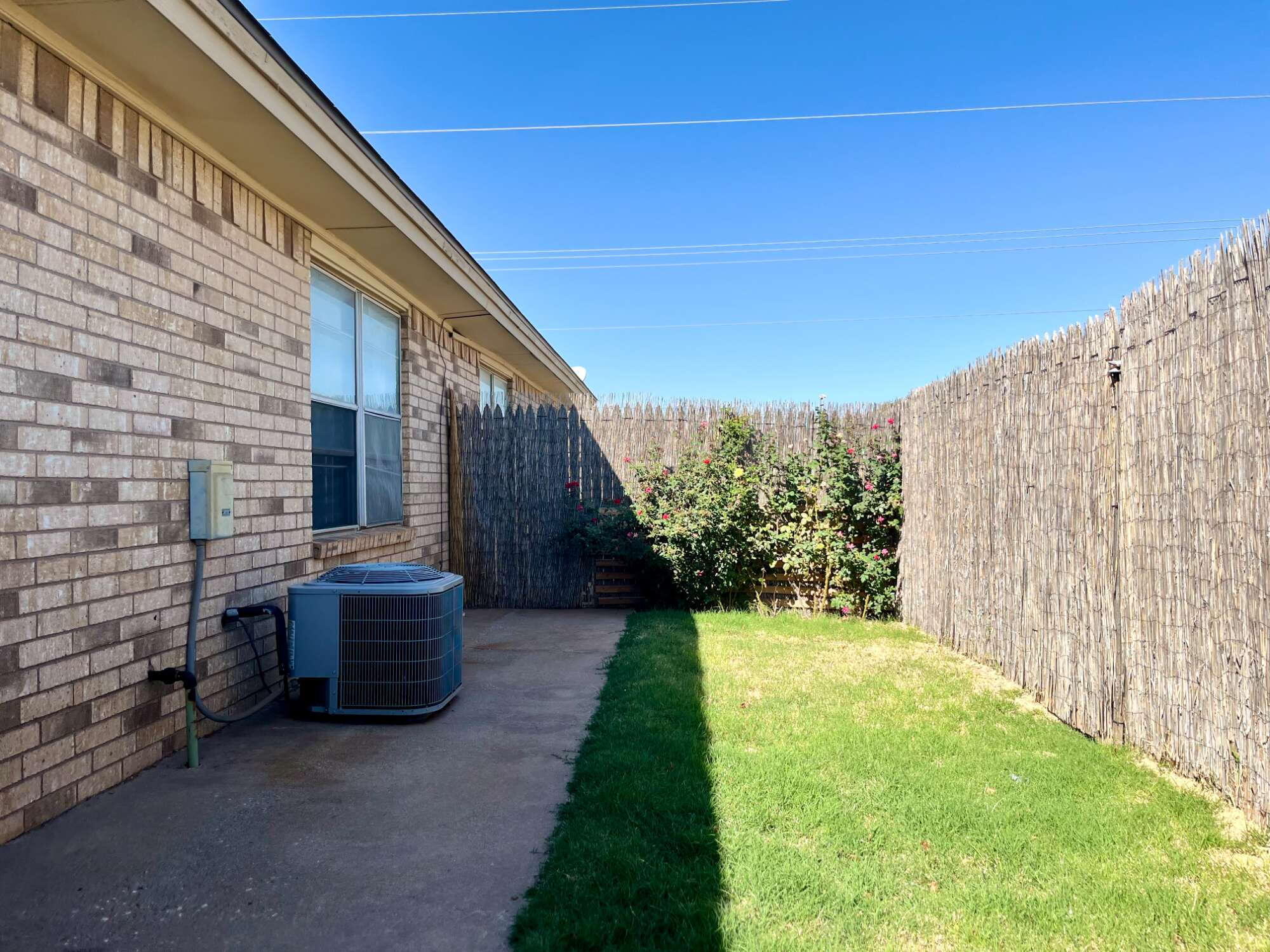 2308 74th Street, Unit A2 Lubbock, TX 79423 - Photo 14 of 16 a view of backyard with garden