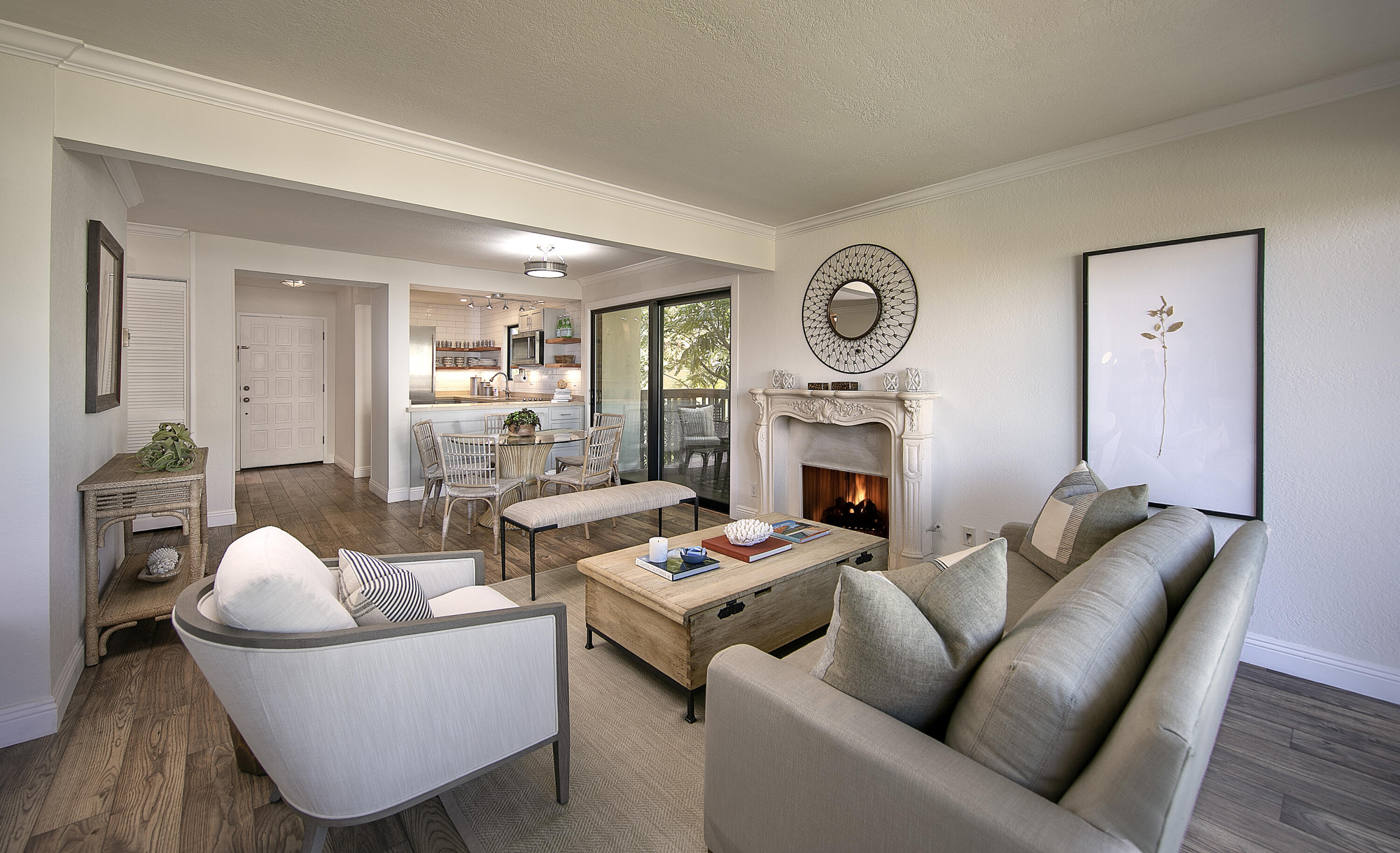 3375 Foothill Road, Unit 821 Carpinteria, CA 93013 - Photo 3 of 12 a living room with furniture and a fireplace