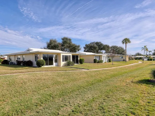 a front view of a house with a ocean view