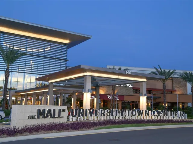 a view of a swimming pool with a yard