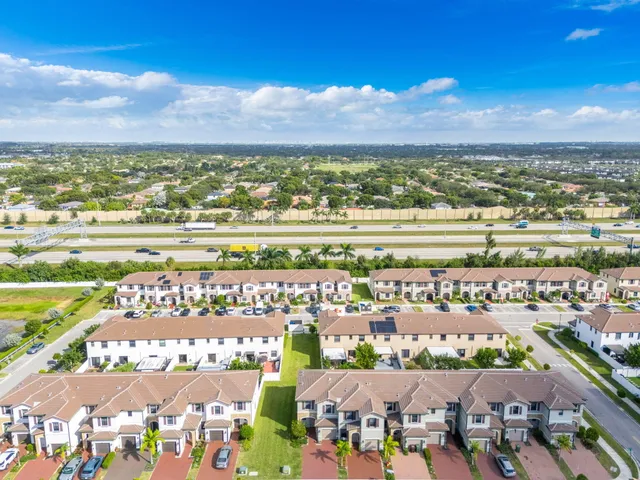 a view of a city with an ocean view