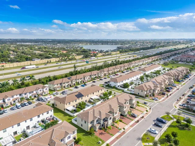 a view of a city with an ocean view