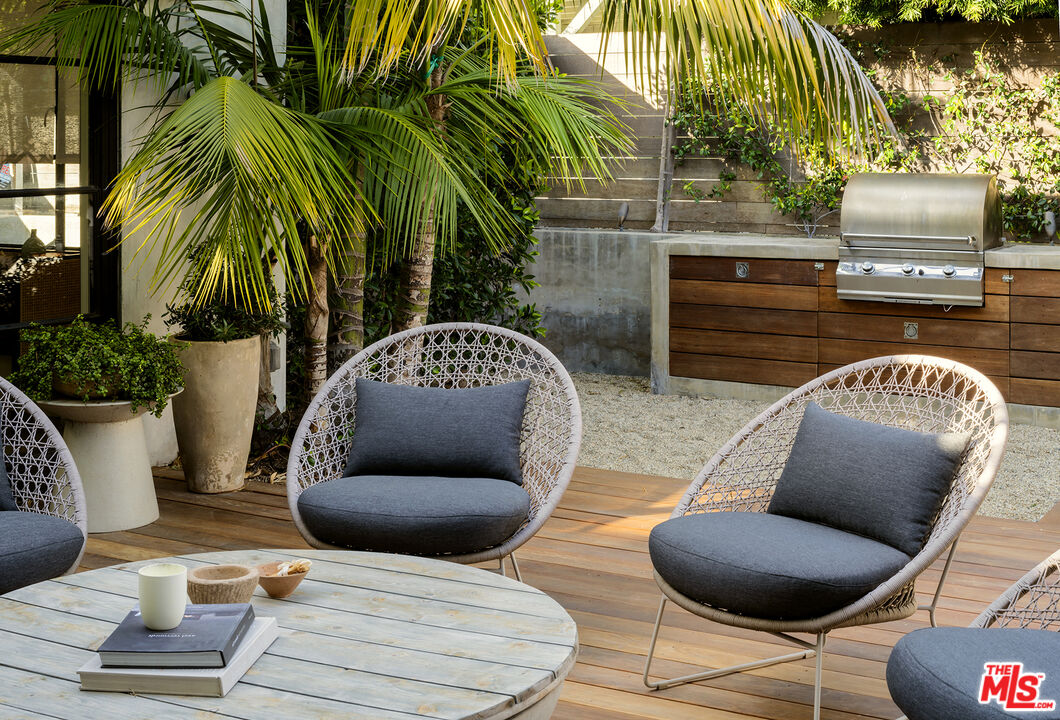 817 Crestmoore Place Venice, CA 90291 - Photo 13 of 22 a outdoor living space with furniture and a potted plant