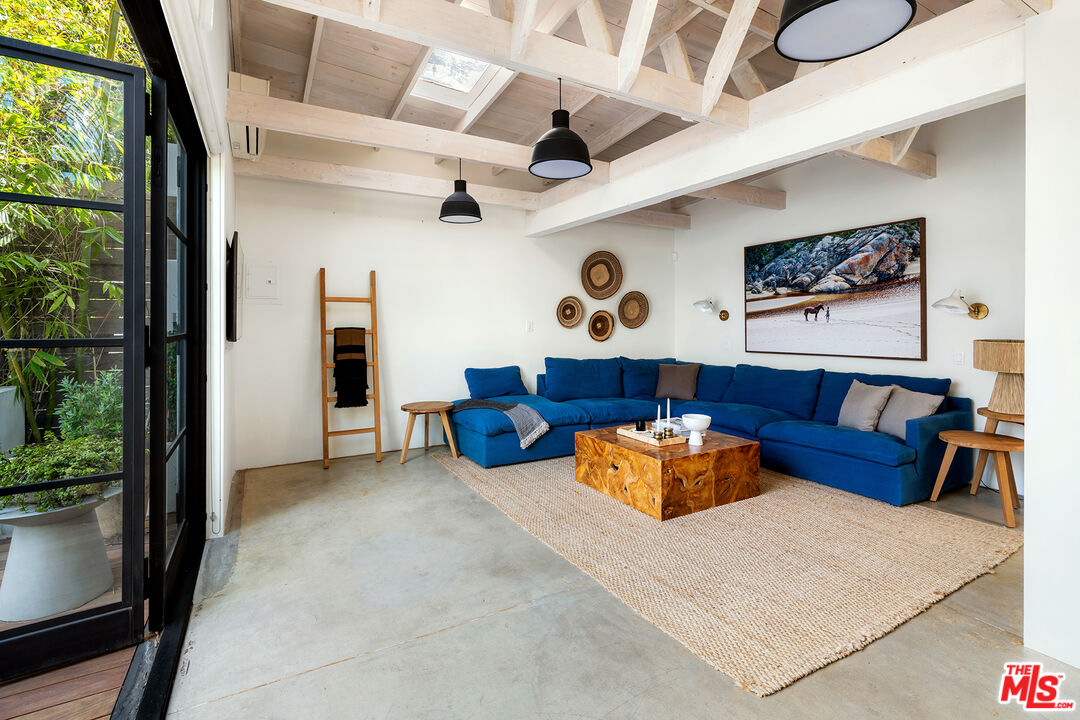 817 Crestmoore Place Venice, CA 90291 - Photo 16 of 22 a living room with furniture and a large window