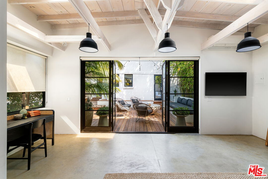 817 Crestmoore Place Venice, CA 90291 - Photo 17 of 22 a living room with furniture and a flat screen tv