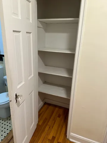 a view of small space with racks on the wall