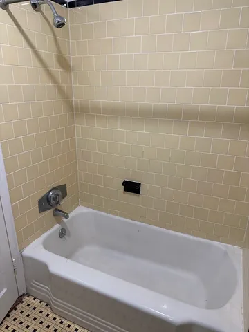 a bathroom with a bathtub
