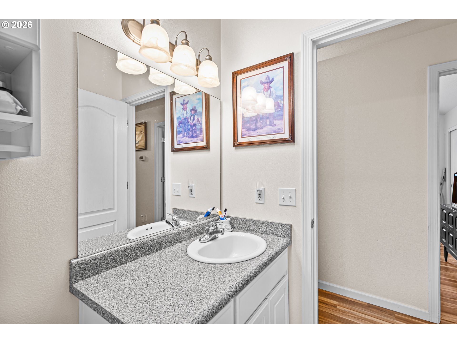 419 Idlewild Drive Cave Junction, OR 97523 - Photo 12 of 47 a bathroom with a sink and a mirror