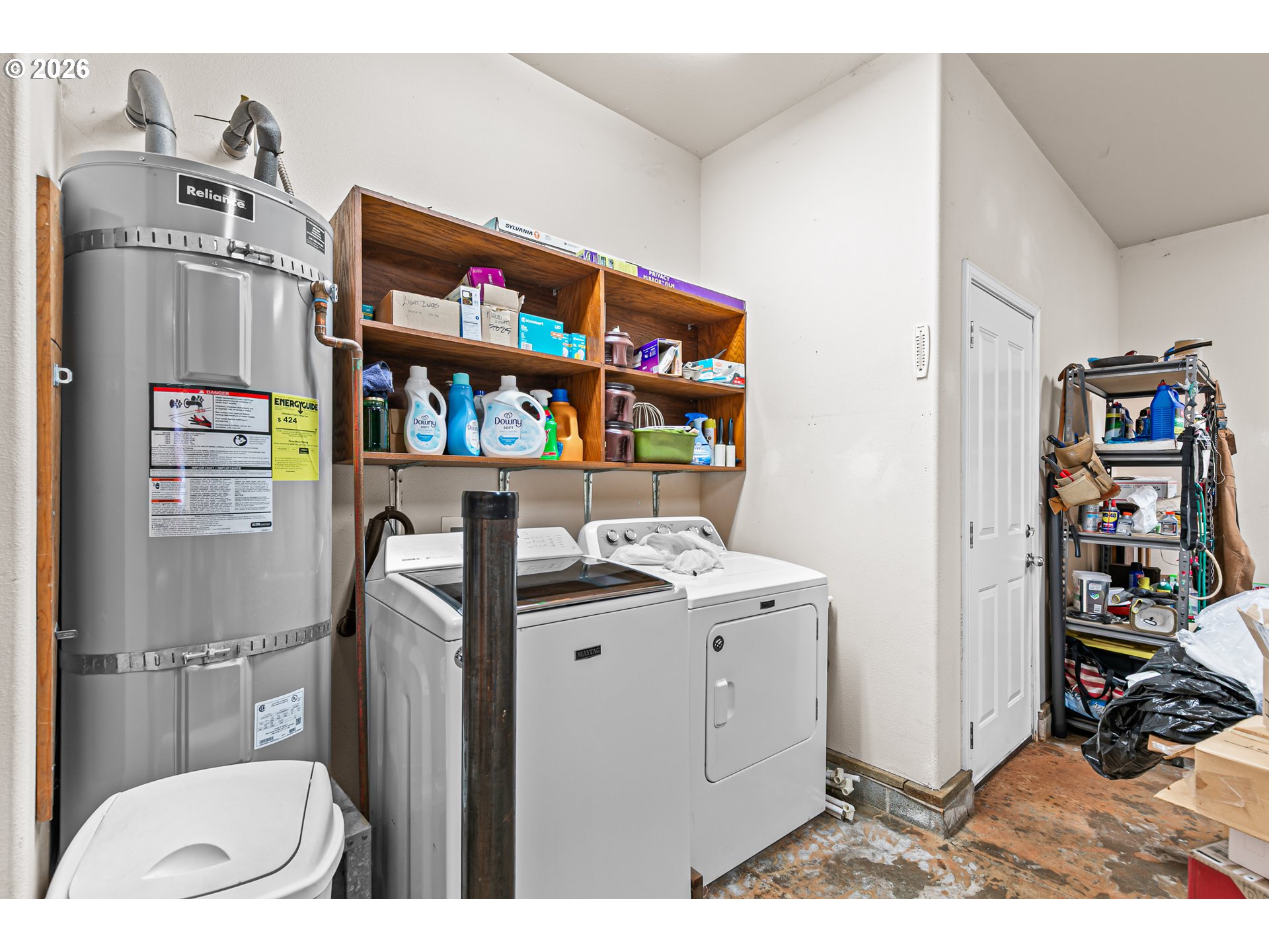 419 Idlewild Drive Cave Junction, OR 97523 - Photo 13 of 47 a room with a storage and utility