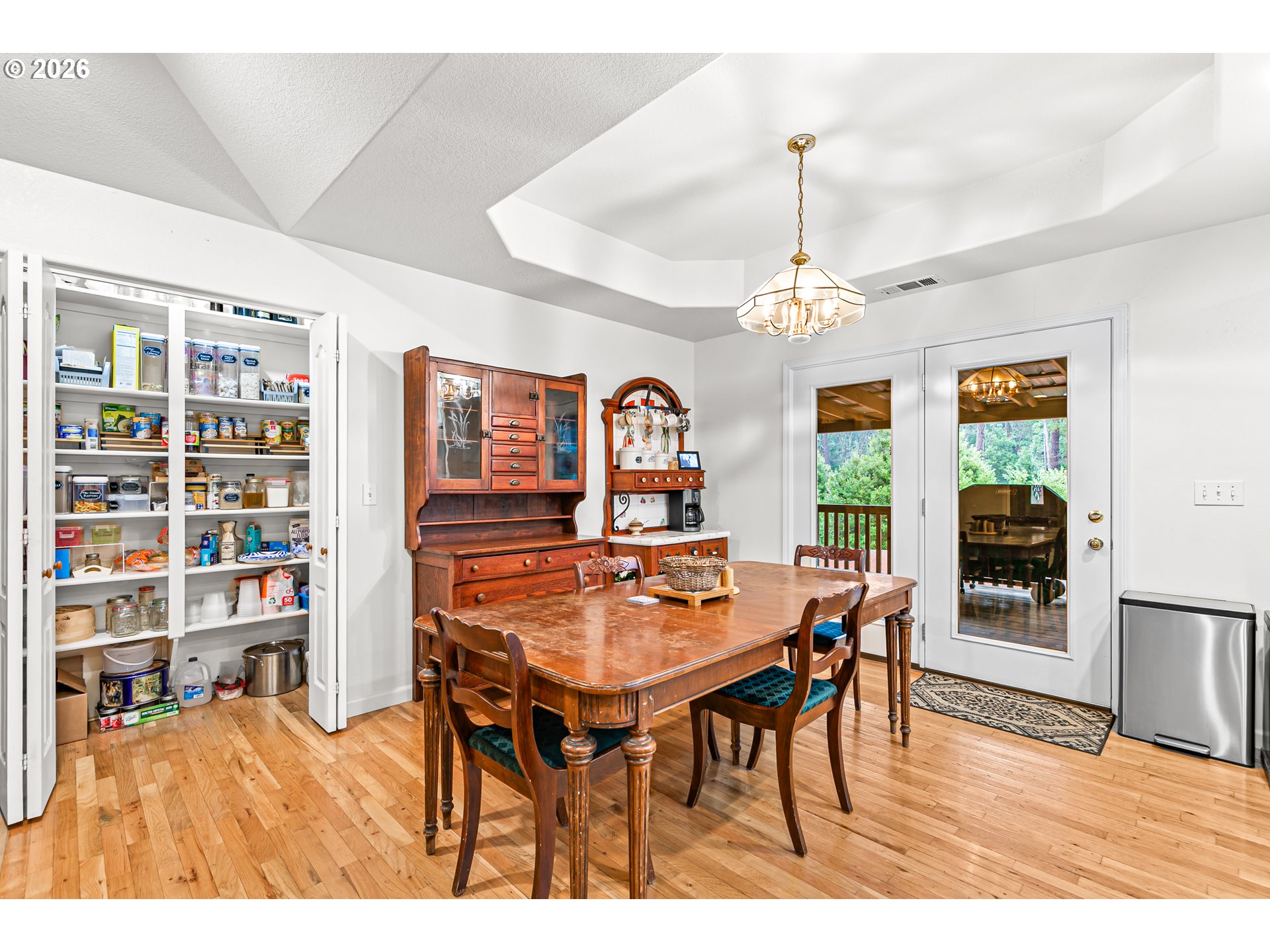 419 Idlewild Drive Cave Junction, OR 97523 - Photo 22 of 47 a dining room with furniture window and wooden floor