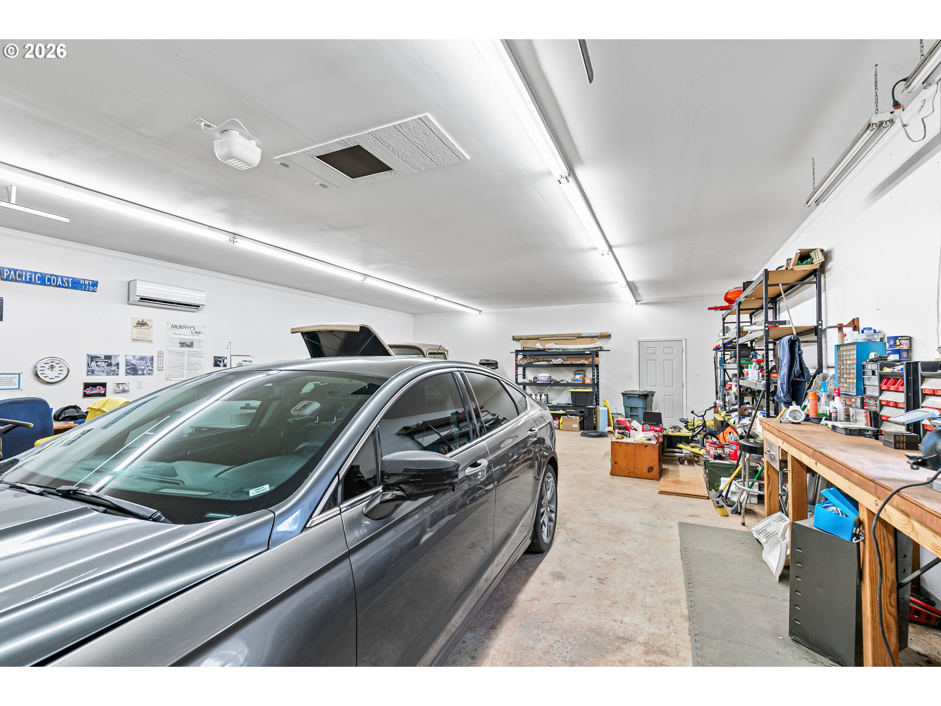 419 Idlewild Drive Cave Junction, OR 97523 - Photo 29 of 47 a view of parking garage with cars parked