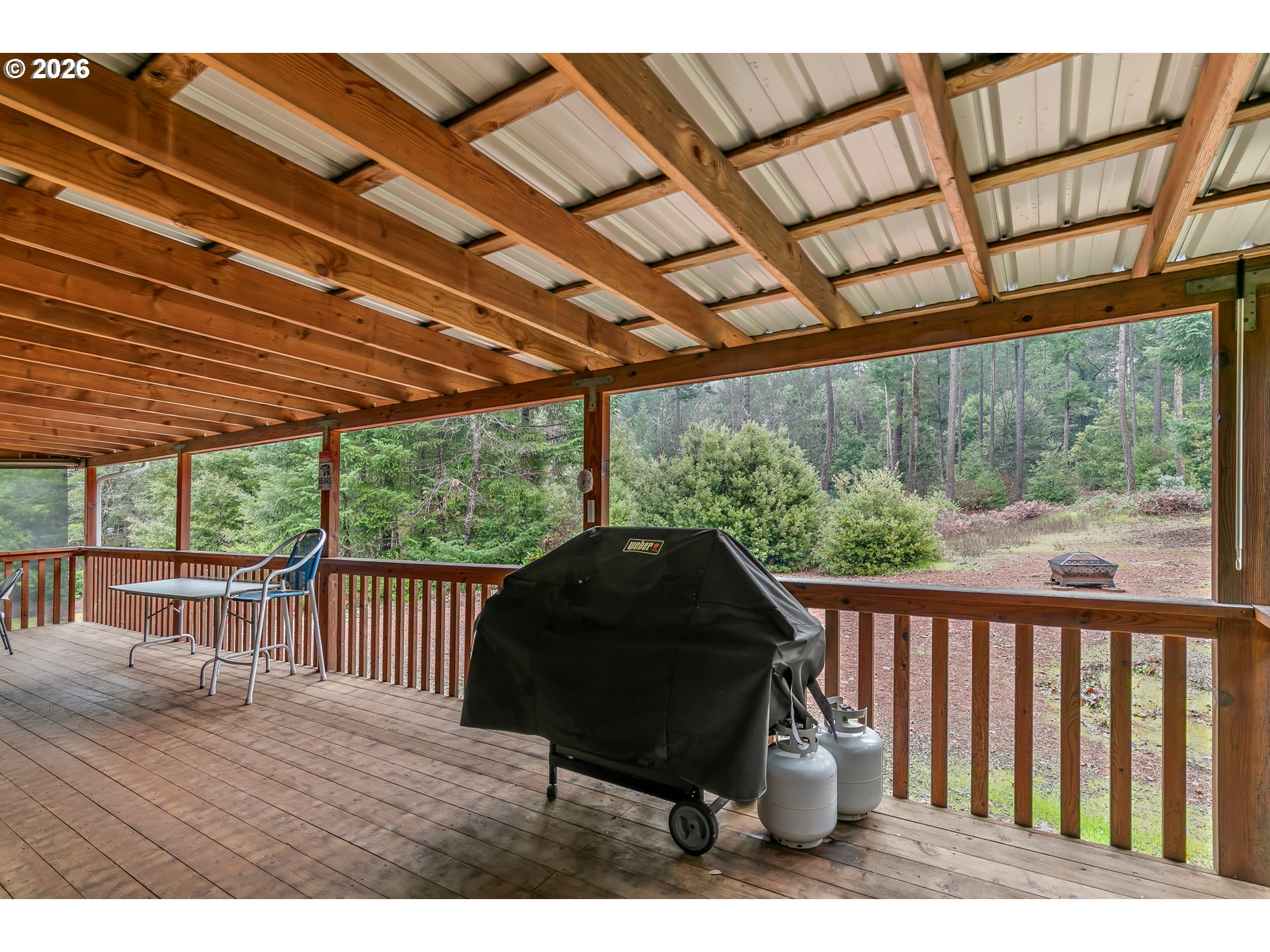 419 Idlewild Drive Cave Junction, OR 97523 - Photo 37 of 47 a view of porch with a patio