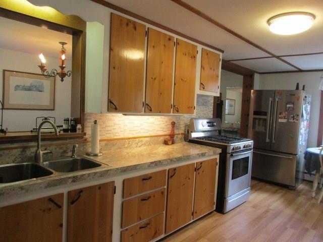 756 East Benton Road Waterville, ME 04901 - Photo 5 of 30 Kitchen with gas range, refrigerator...