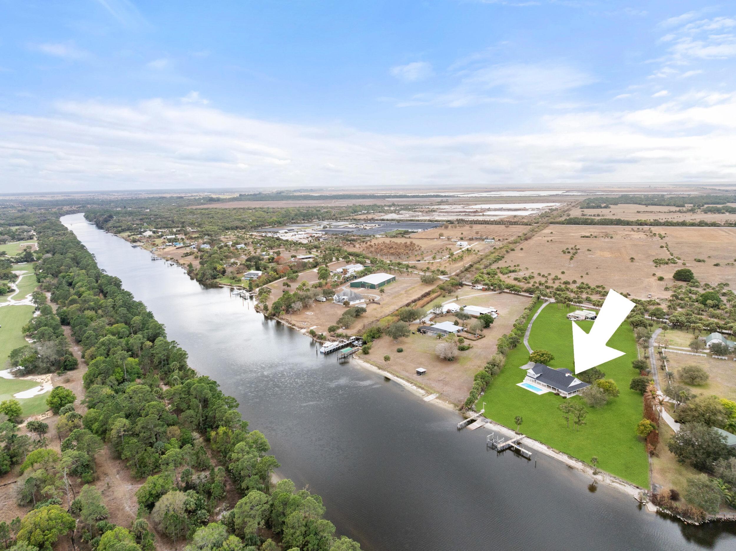 10125 Southwest Green Ridge Lane, Unit LANE Palm City, FL 34990 - Photo 2 of 84 69_dji_20260227040034_0139_d.1