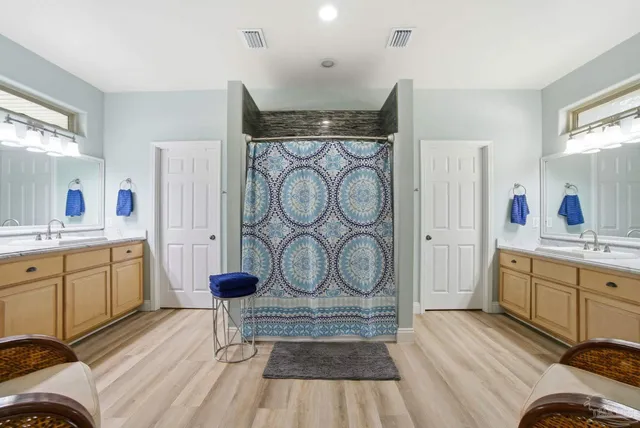 a bedroom with a bed and furniture