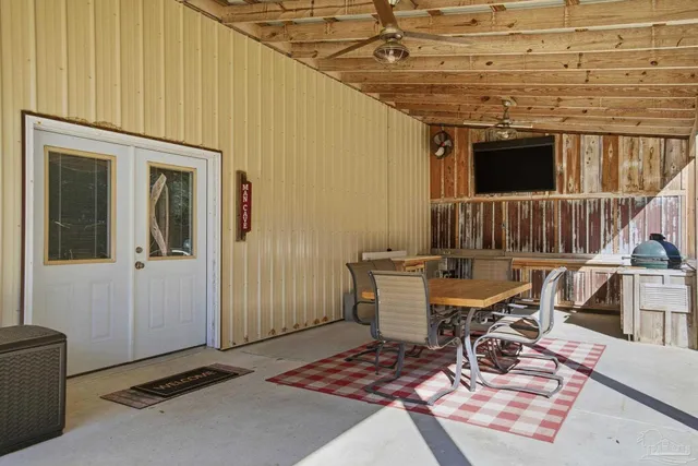 a bathroom with a sink a vanity and a mirror