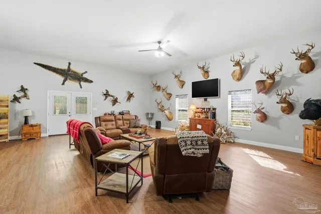 an aerial view of a houses with a yard