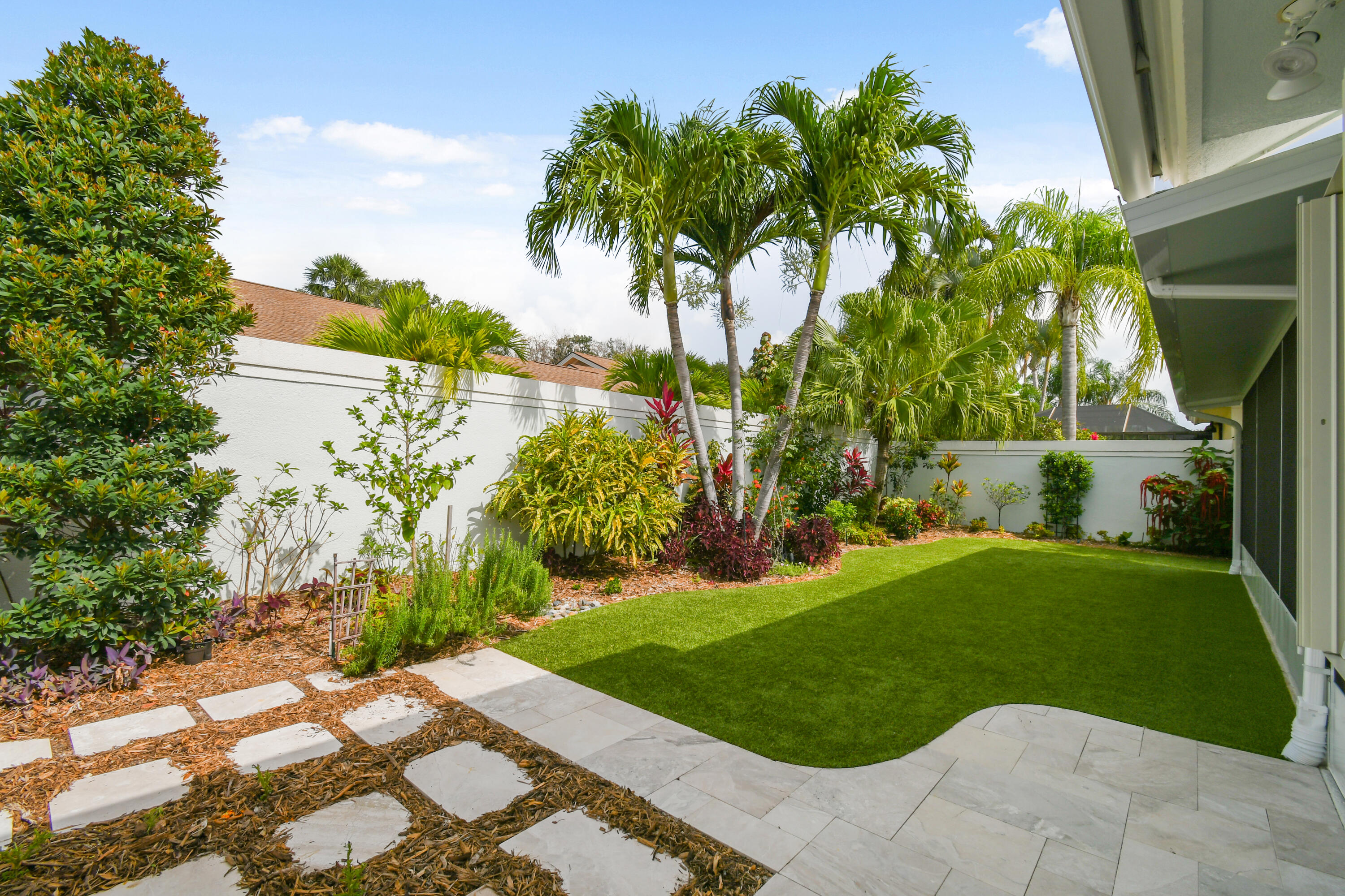 438 River Edge Road Jupiter, FL 33477 - Photo 55 of 80 Lovely landscaped yard3