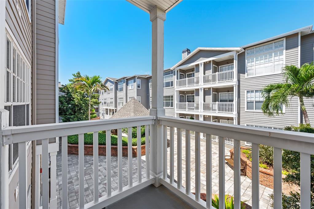800 South Dakota Avenue, Unit 330 Tampa, FL 33606 - Photo 12 of 25 a view of a balcony with a potted plant