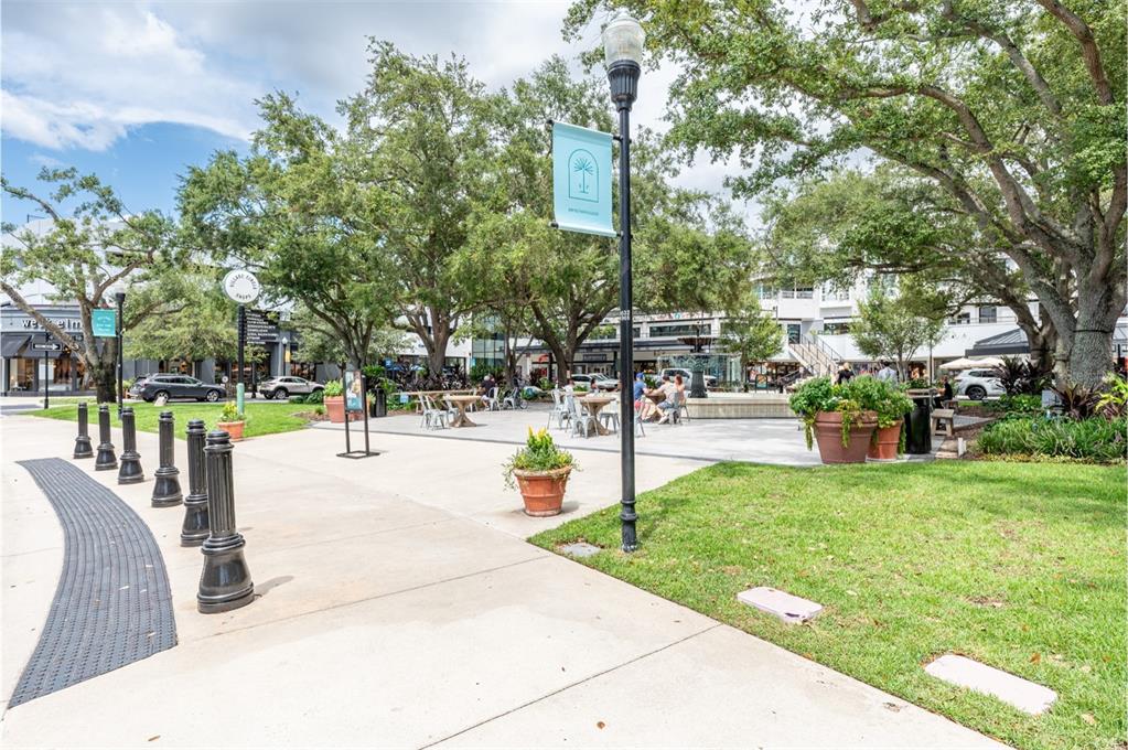 800 South Dakota Avenue, Unit 330 Tampa, FL 33606 - Photo 19 of 25 a swimming pool with outdoor seating and garden