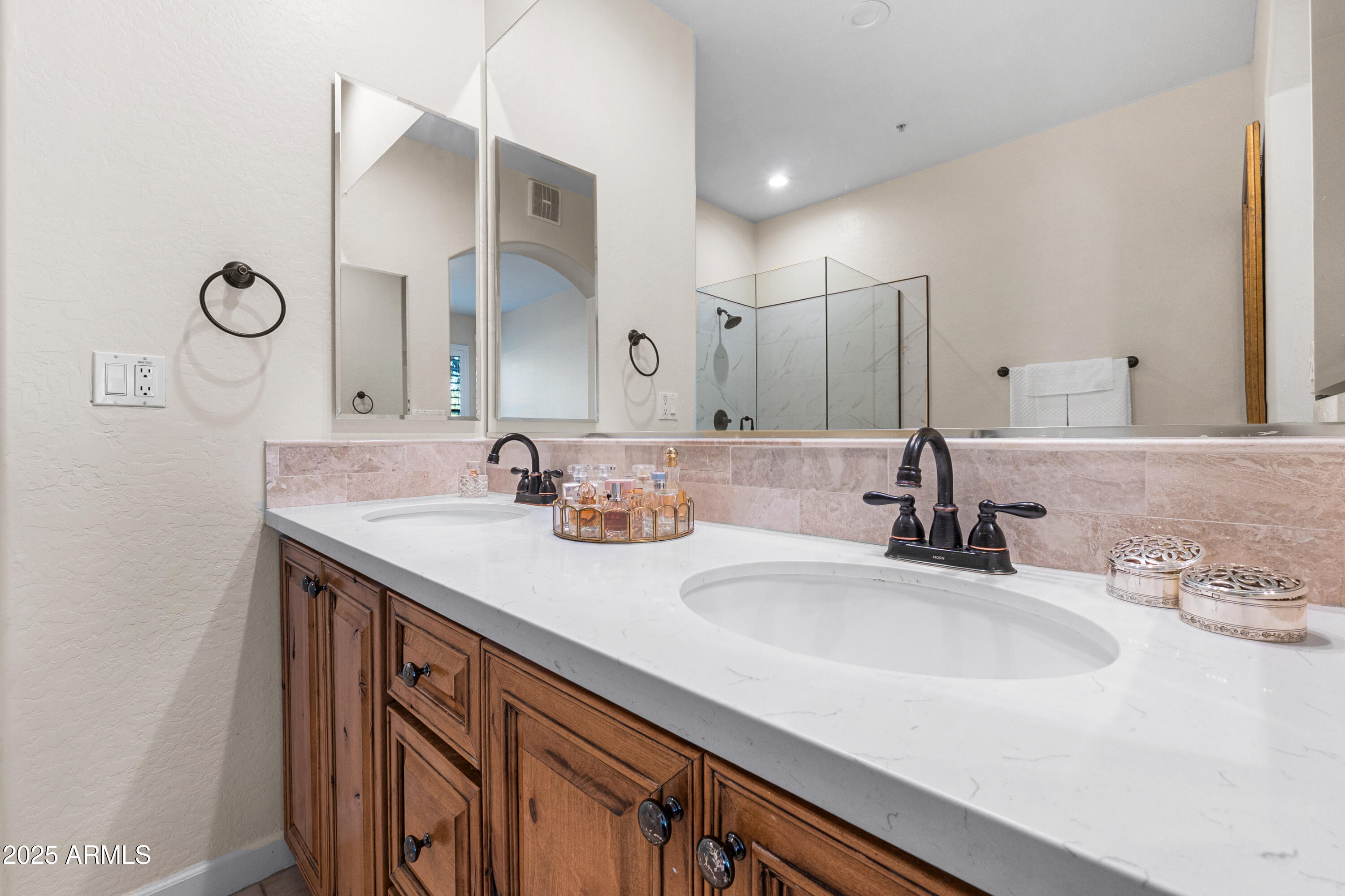 20750 North 87th Street, Unit 1050 Scottsdale, AZ 85255 - Photo 12 of 21 a bathroom with a sink and a mirror