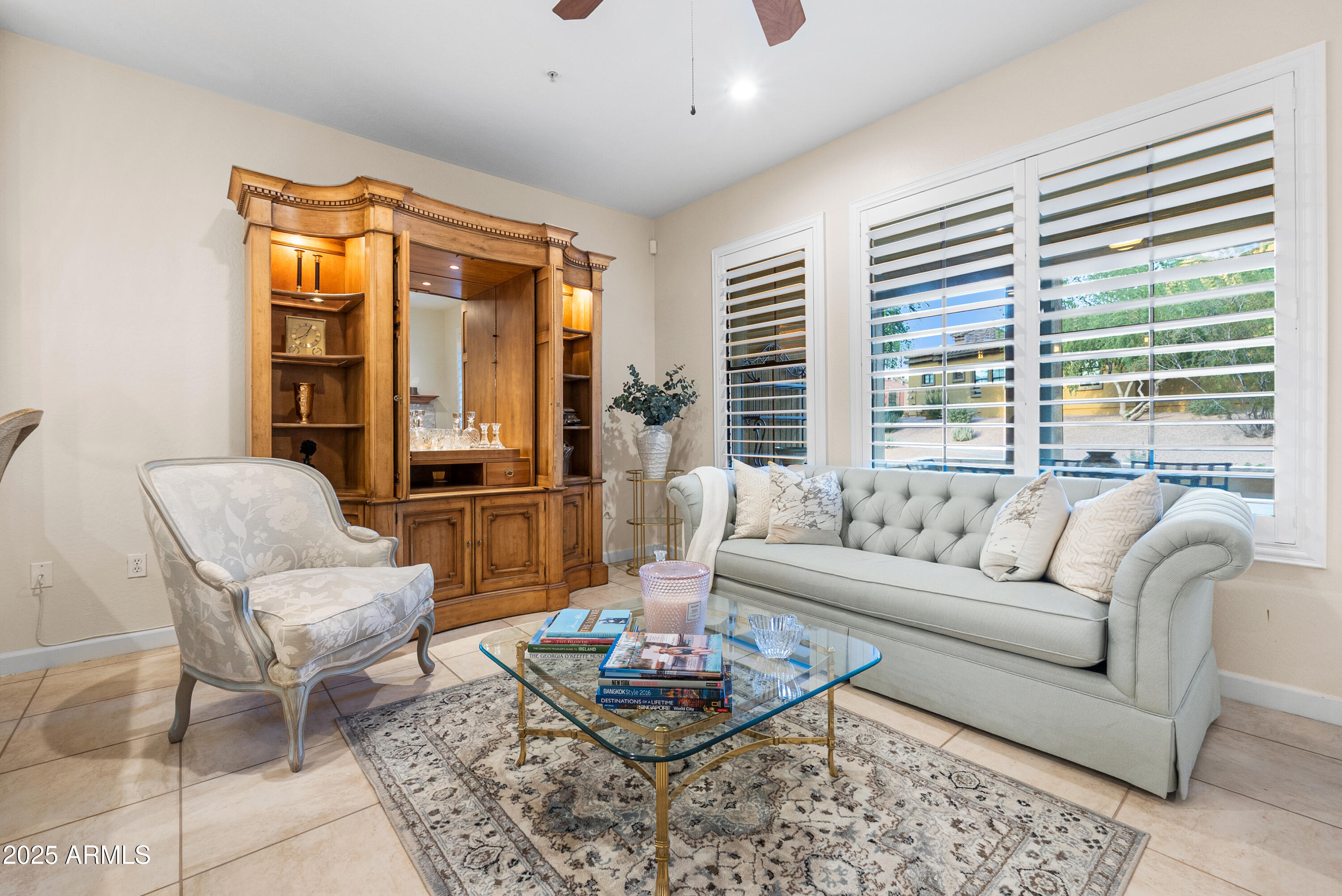 20750 North 87th Street, Unit 1050 Scottsdale, AZ 85255 - Photo 9 of 21 a living room with furniture and a large window