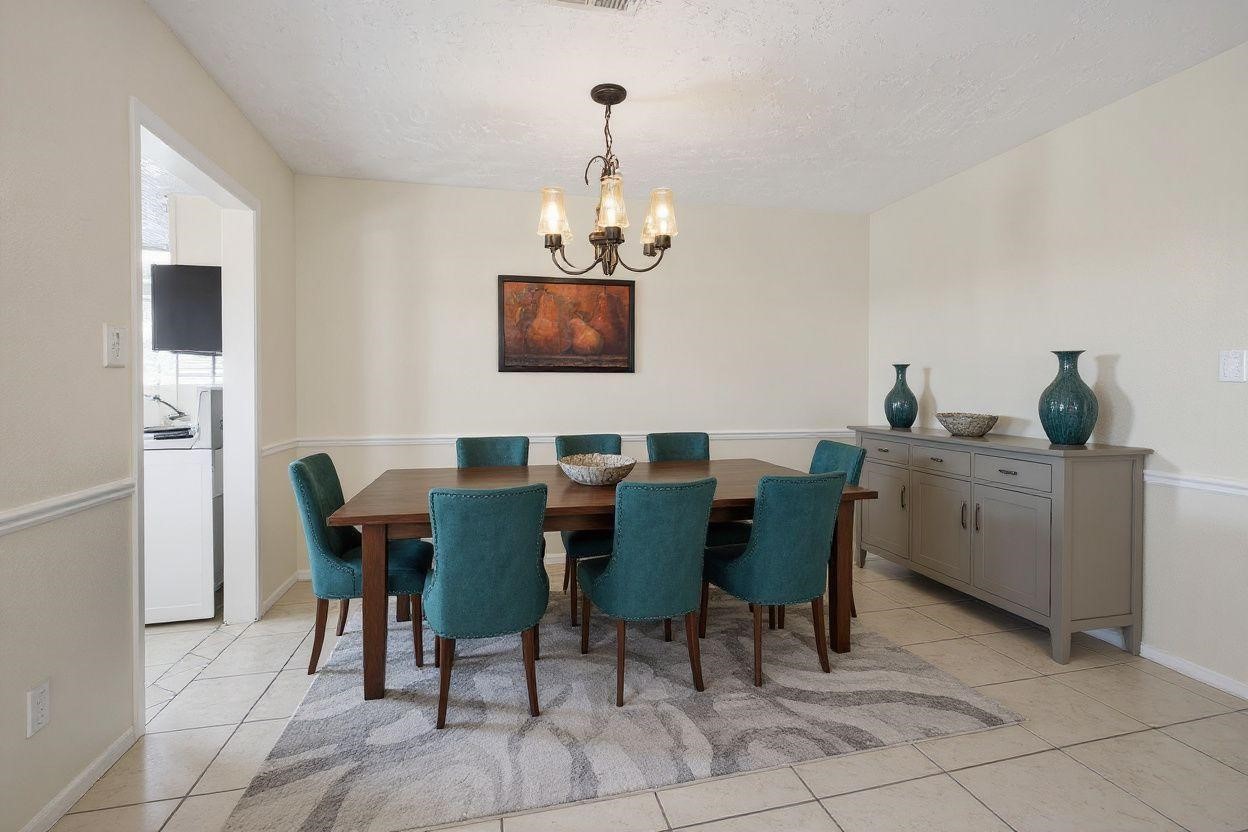 8638 Little River Road Houston, TX 77064 - Photo 5 of 14 Dining Room (Virtual Staged):
Bright, open space, virtually staged to show layout potential.