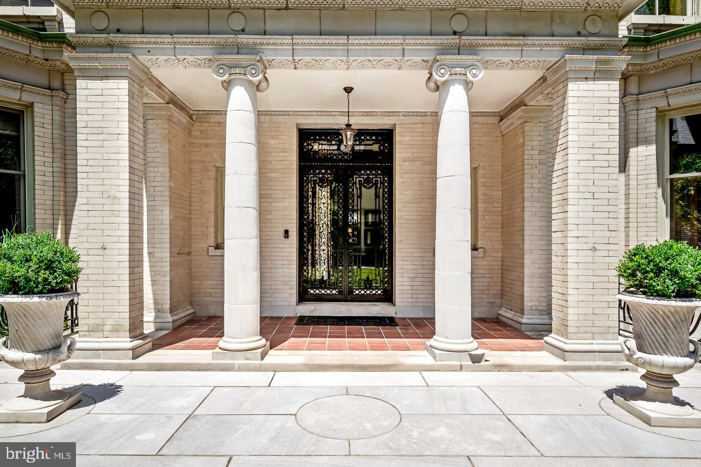 4200 Pine Street, Unit 108A Philadelphia, PA 19104 - Photo 15 of 49 a view of a patio with table and chairs and potted plants