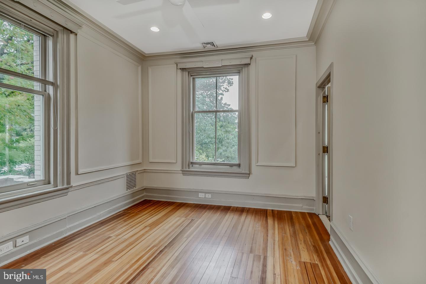 4200 Pine Street, Unit 108A Philadelphia, PA 19104 - Photo 30 of 49 a view of empty room with wooden floor and fan
