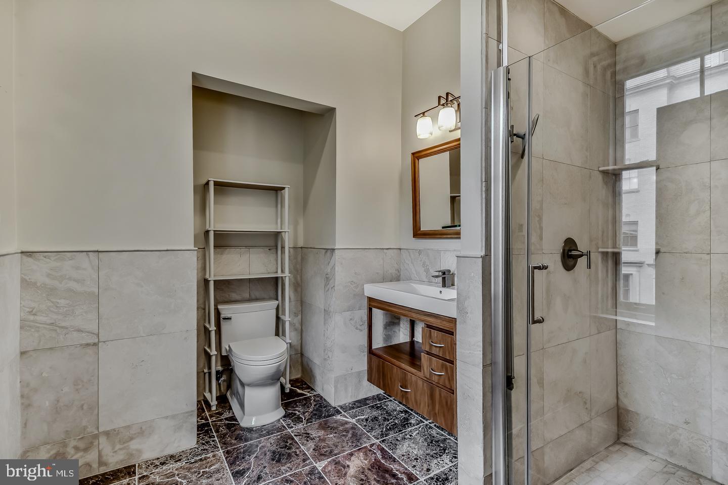 4200 Pine Street, Unit 108A Philadelphia, PA 19104 - Photo 35 of 49 a bathroom with a toilet and a shower