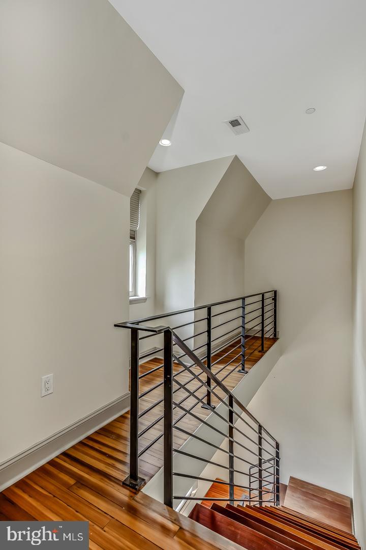 4200 Pine Street, Unit 108A Philadelphia, PA 19104 - Photo 36 of 49 a view of entryway and hall with wooden floor
