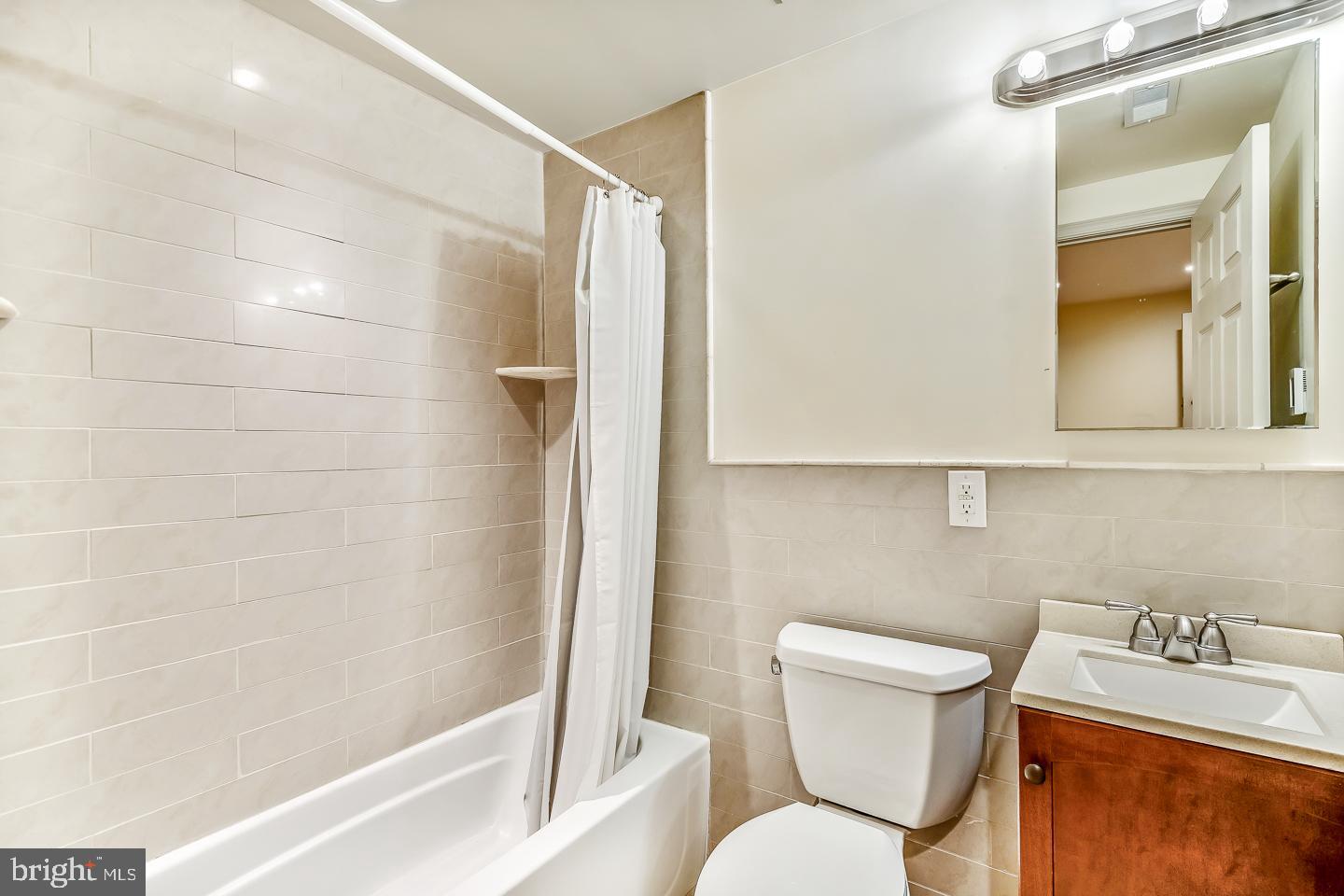 4200 Pine Street, Unit 108A Philadelphia, PA 19104 - Photo 41 of 49 a bathroom with a sink toilet and shower