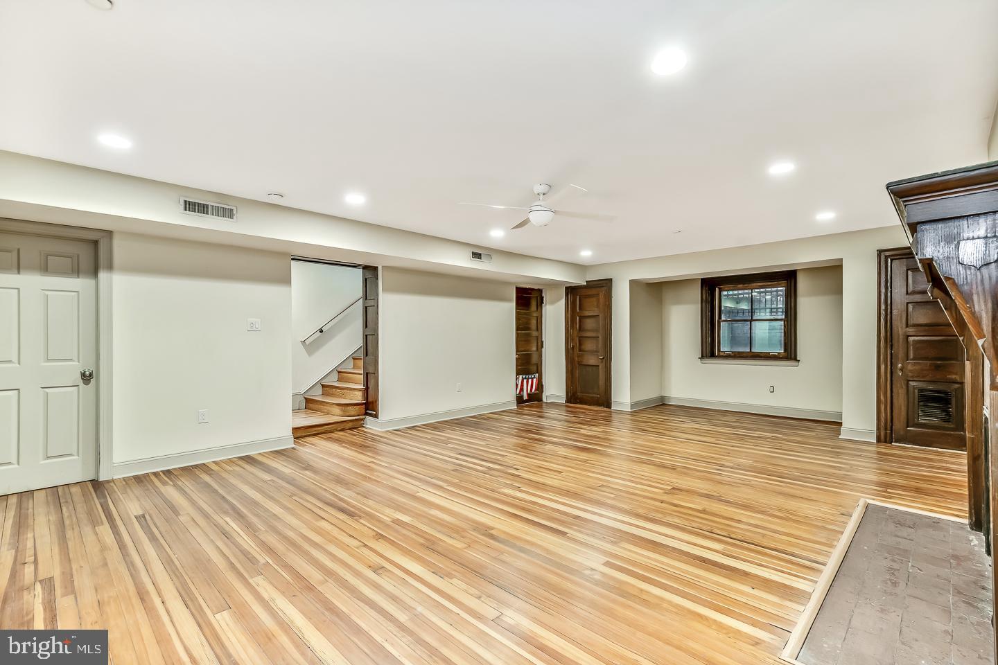 4200 Pine Street, Unit 108A Philadelphia, PA 19104 - Photo 44 of 49 a view of empty room with wooden floor and fan