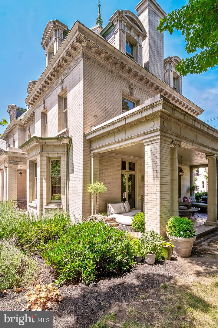 4200 Pine Street, Unit 108A Philadelphia, PA 19104 - Photo 7 of 49 front view of a brick house with a large window