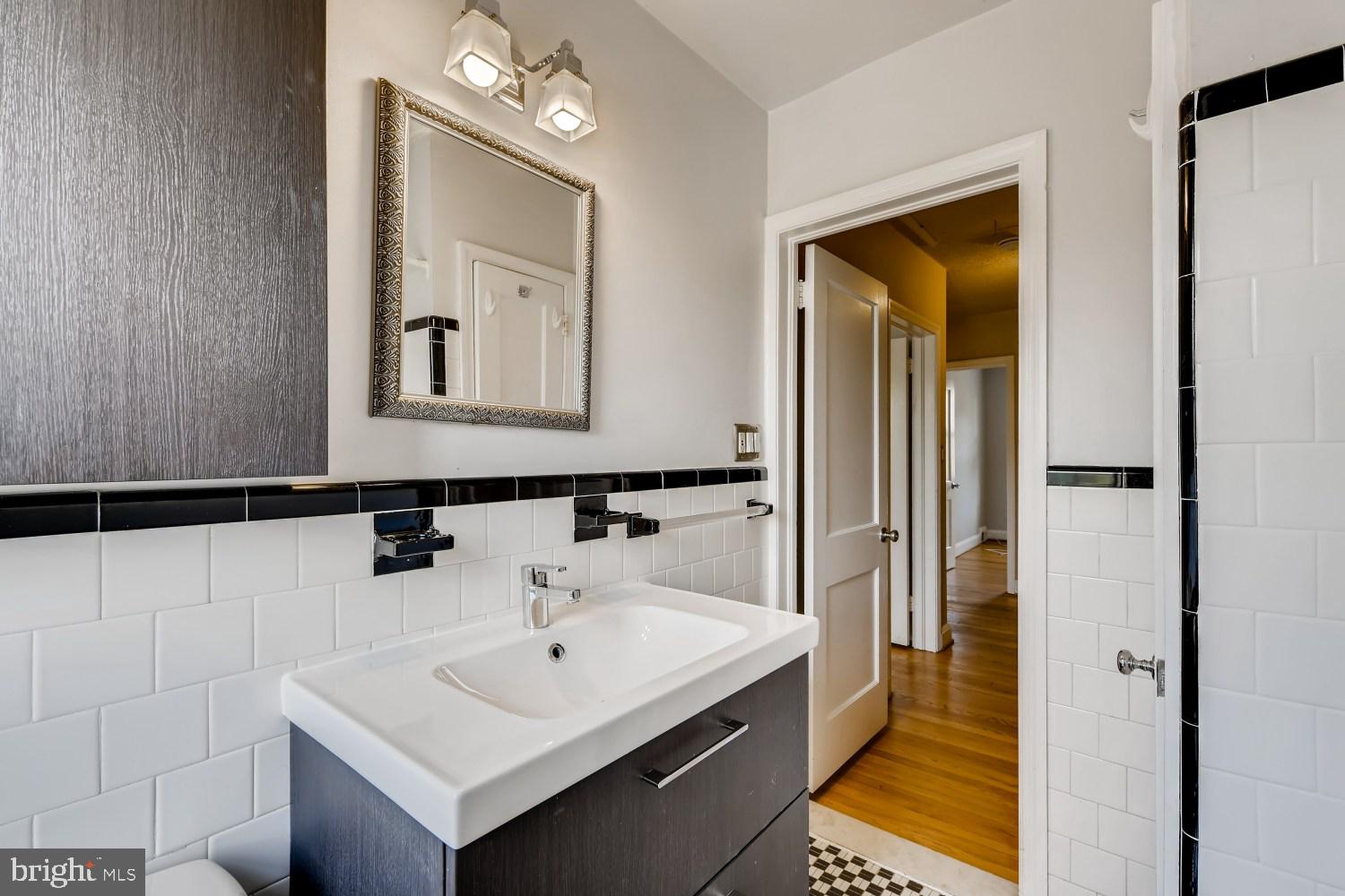 1717 Kennoway Road Towson, MD 21286 - Photo 16 of 31 Updated fixtures in bathroom / black & white tile