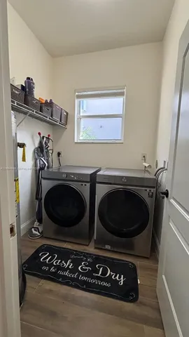 a utility room with dryer and washer