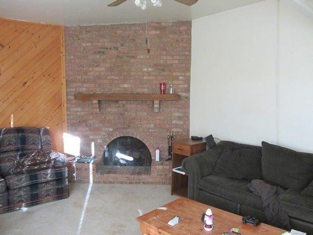 2513 47th Street Lubbock, TX 79413 - Photo 3 of 10 a living room with furniture and a fireplace