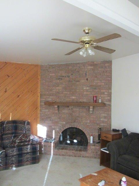 2513 47th Street Lubbock, TX 79413 - Photo 4 of 10 a living room with furniture and a fireplace