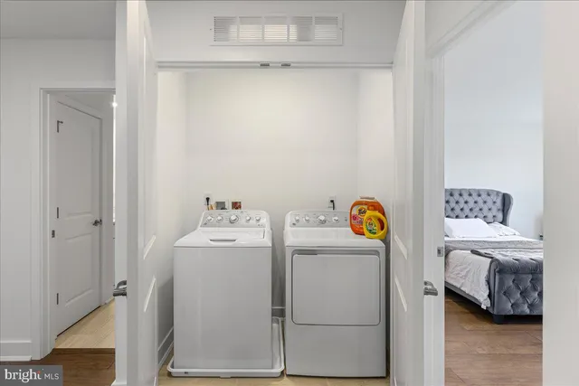 a utility room with dryer and washer