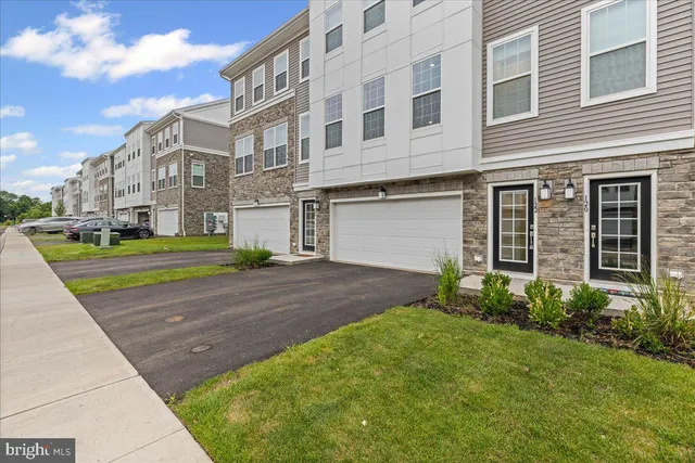 a view of a building with a yard