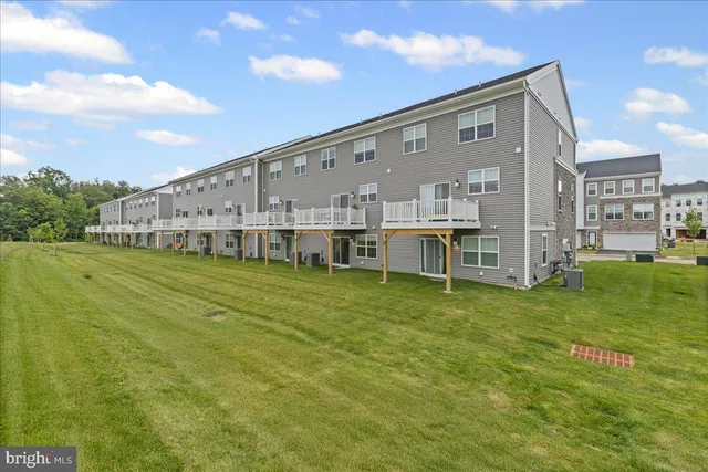 a view of a house with a big yard