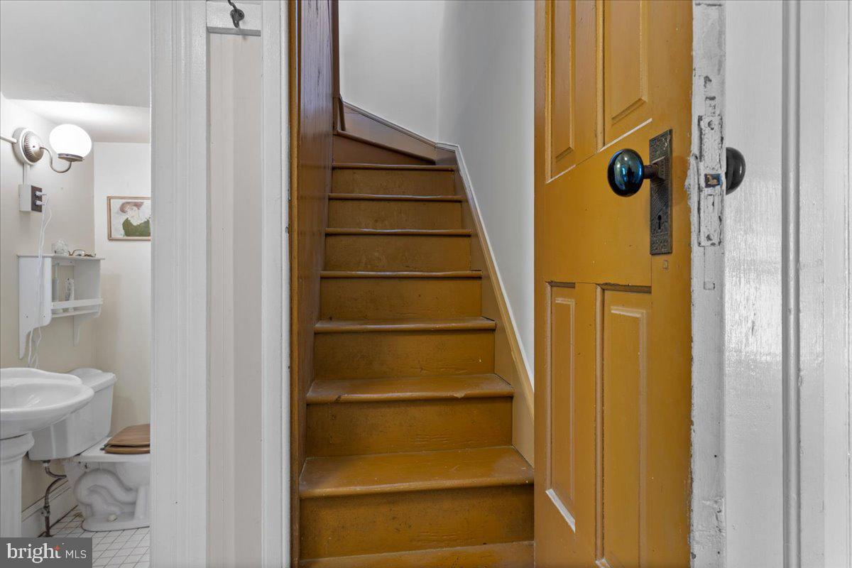 2485 Emmanuel Church Road Huntingtown, MD 20639 - Photo 17 of 67 Back Staircase leads to bedroom