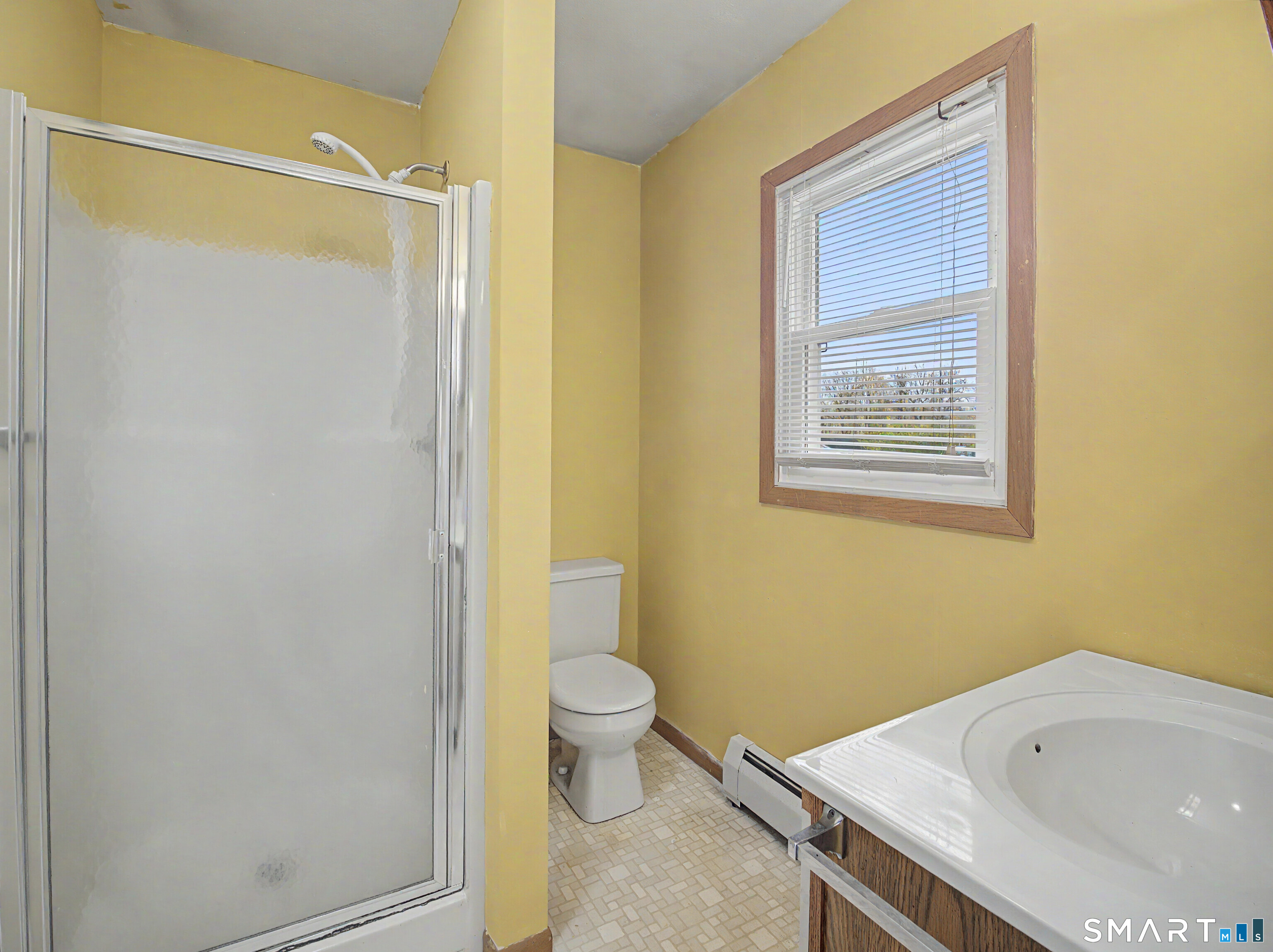 134 Roulin Street Torrington, CT 06790 - Photo 13 of 27 a bathroom with a sink and a tub