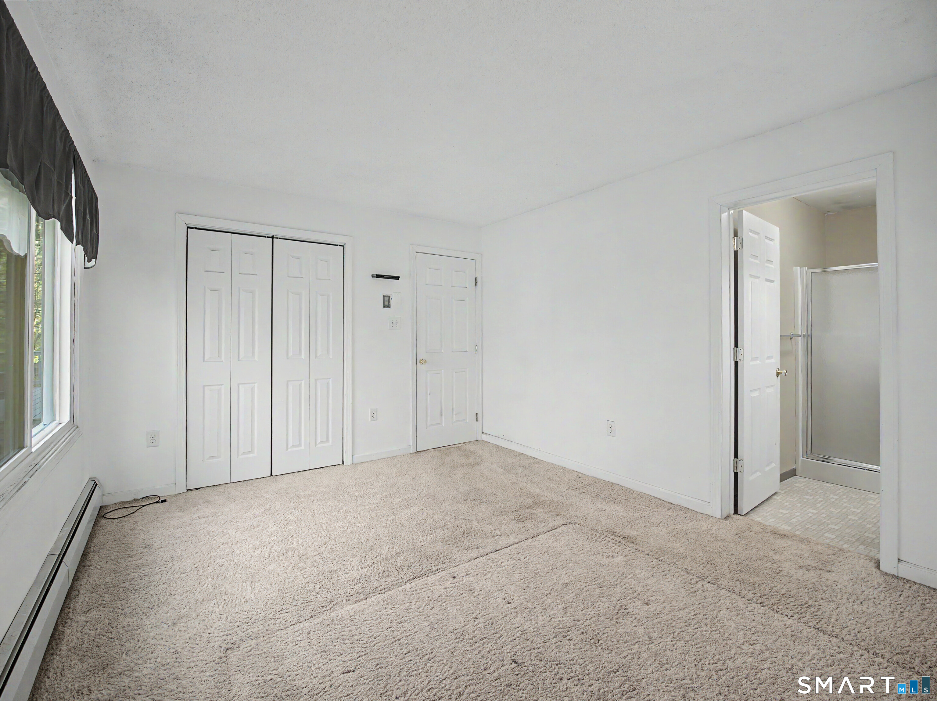 134 Roulin Street Torrington, CT 06790 - Photo 15 of 27 a view of an empty room and a window