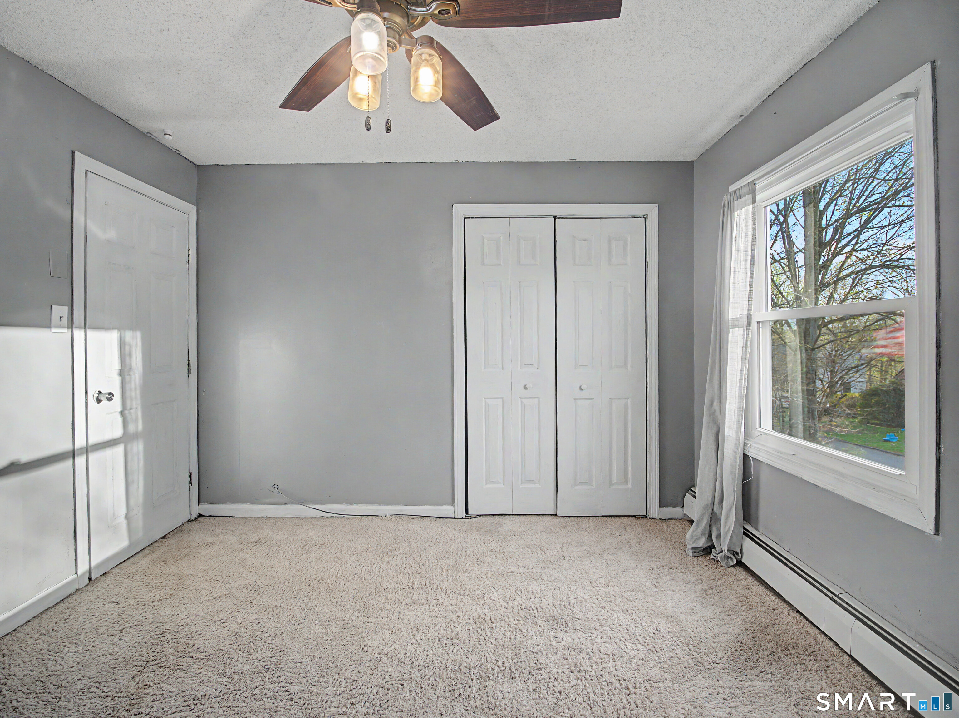 134 Roulin Street Torrington, CT 06790 - Photo 16 of 27 a view of an empty room with a window