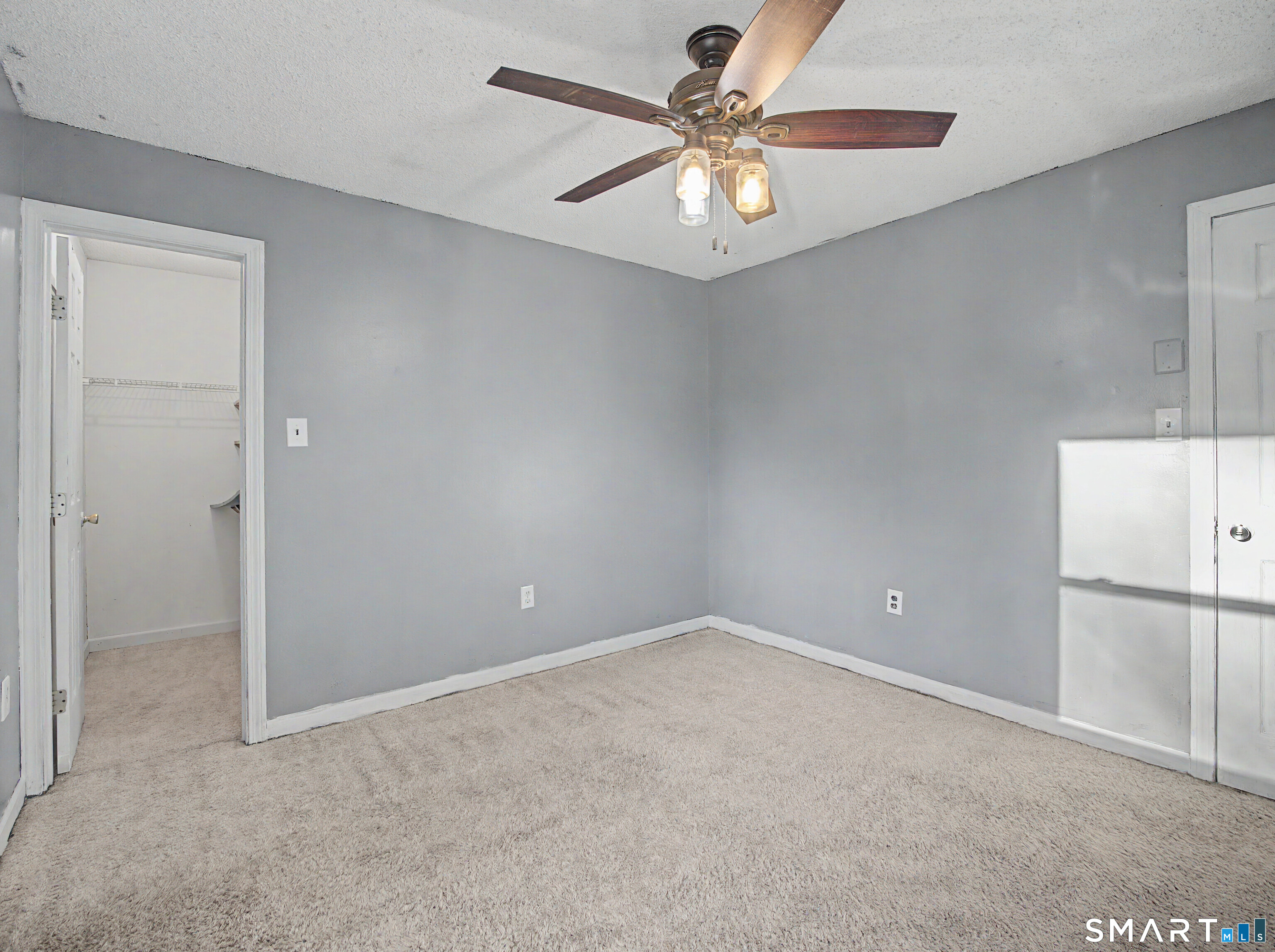 134 Roulin Street Torrington, CT 06790 - Photo 17 of 27 an empty room with chandelier fan